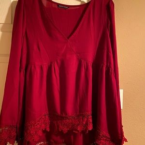 Red blouse with lace accents